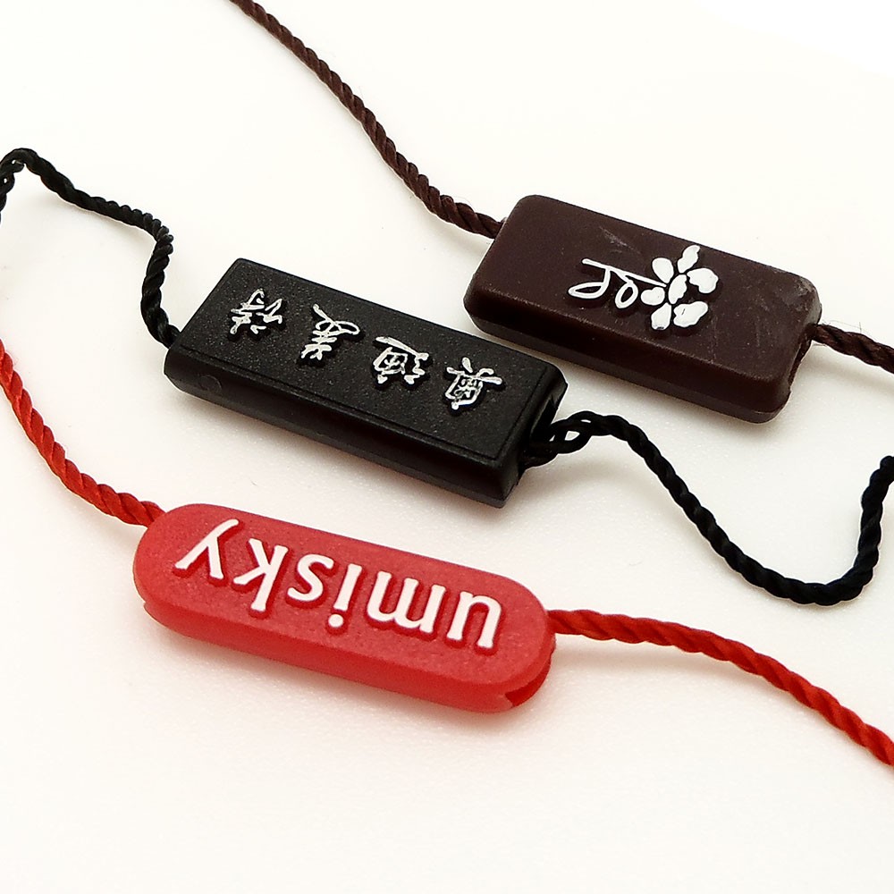 服装香蕉黄色视频在线观看之吊牌吊粒